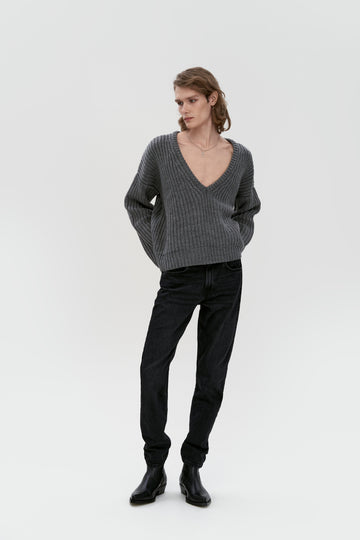 sweater with a deep v-neck sleeve in grey color